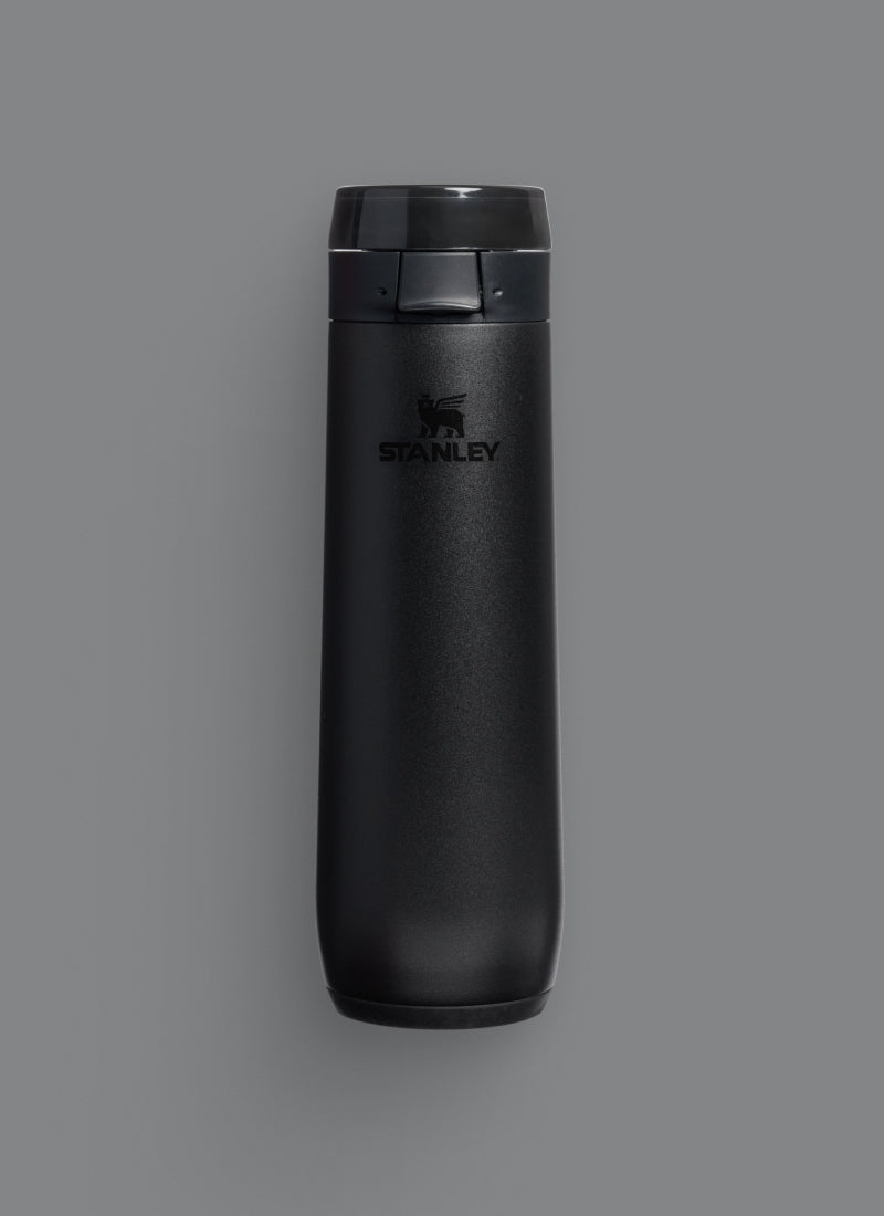 Black 2.0 bottle on a charcoal background